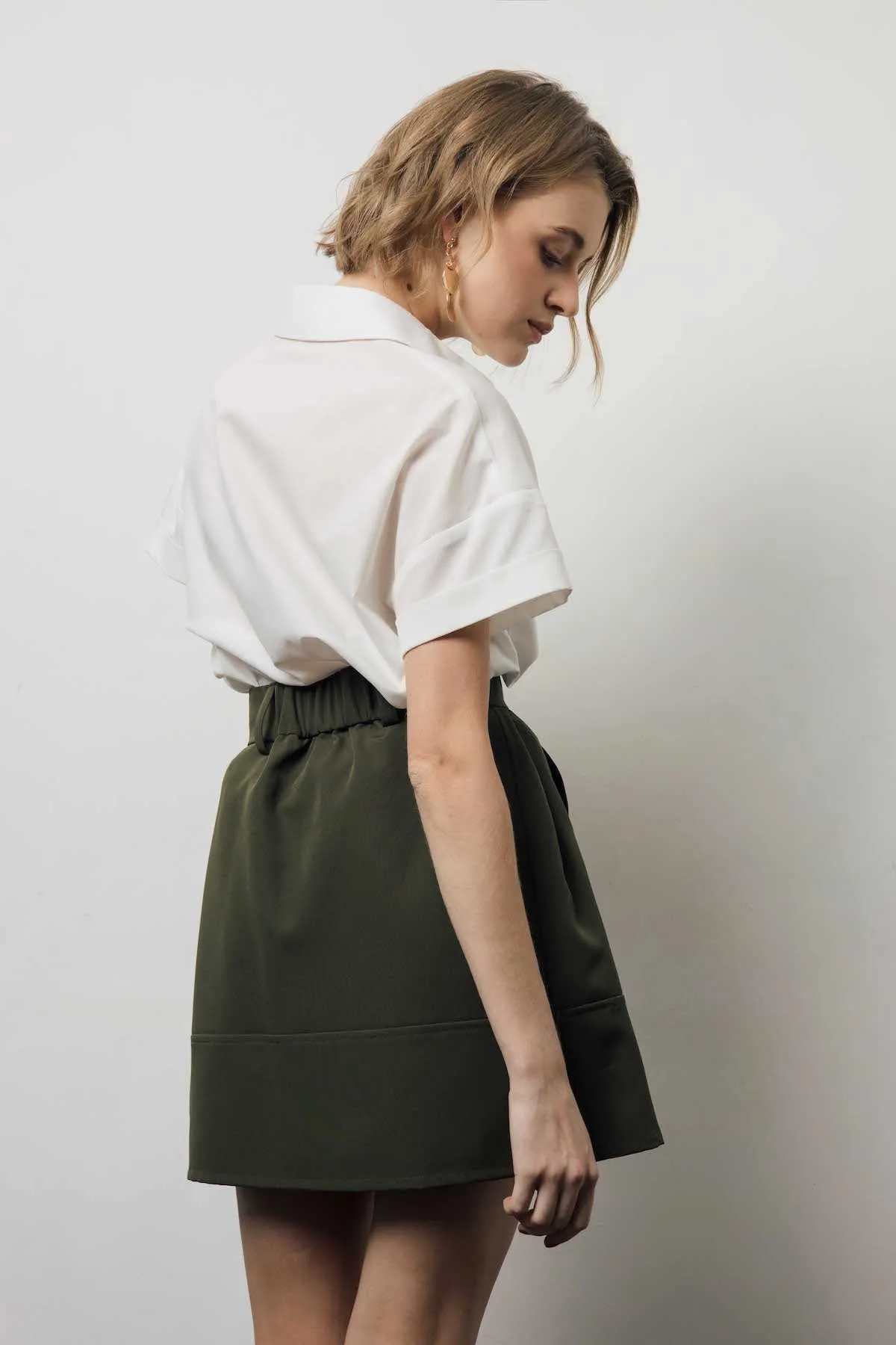 Colin Mini Skirts In Olive Green